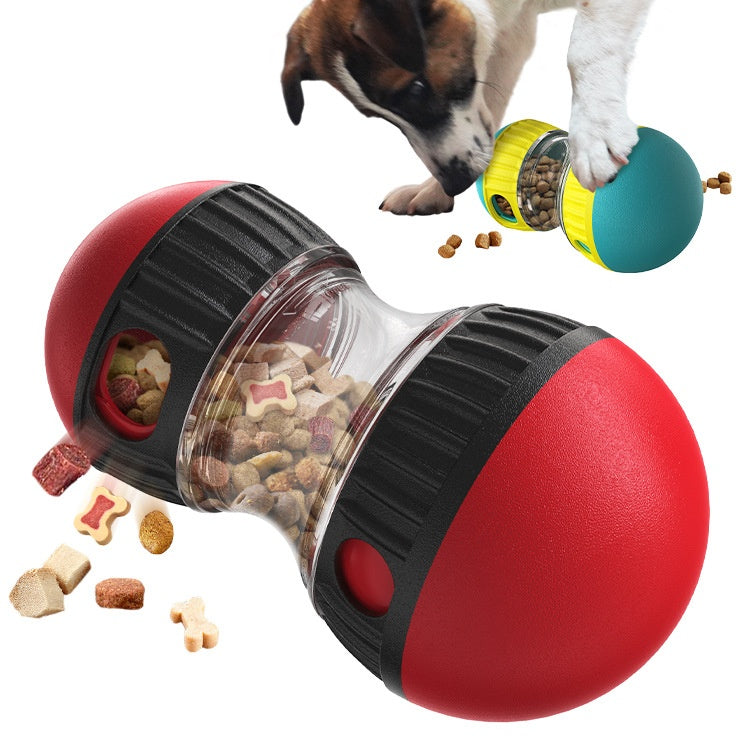 Dog nosing the red tumbler across the floor