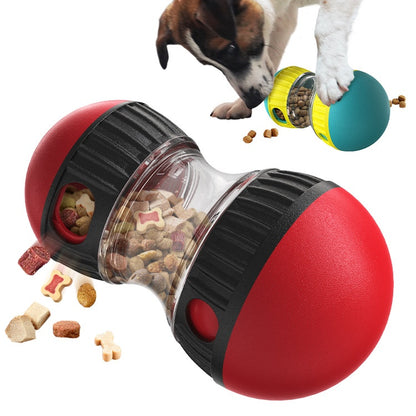 Dog nosing the red tumbler across the floor
